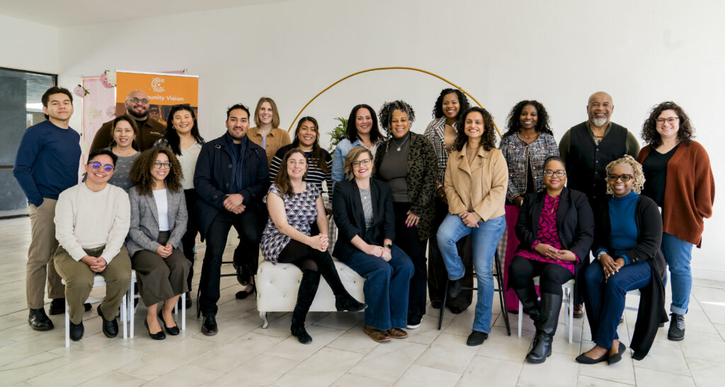 Group of people from CalCORE smiling at the camera.